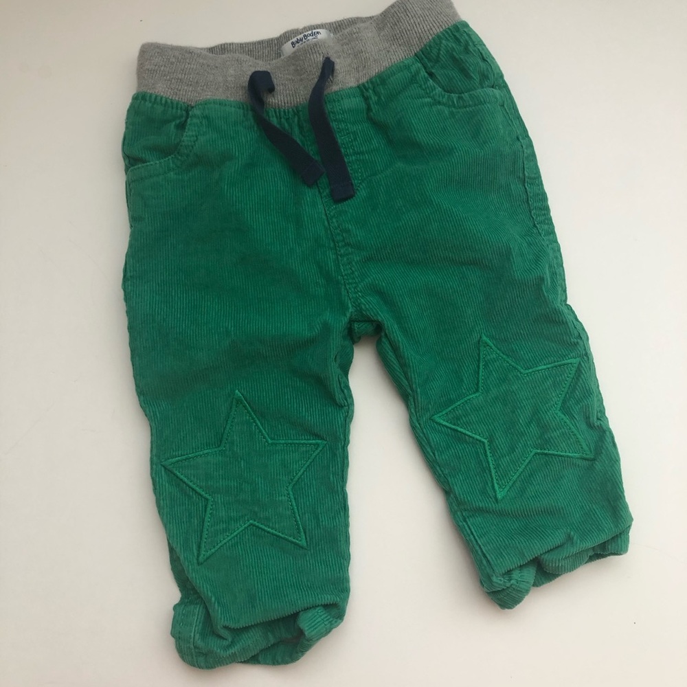Baby Boden green corduroy pants with star detail